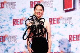 Lucy Liu attends the premiere of "Red One - Alarmstufe Weihnachten!" at UCI Luxe Mercedes Platz in a sculptural Zuhair Murad gown on November 03, 2024 in Berlin, Germany.
