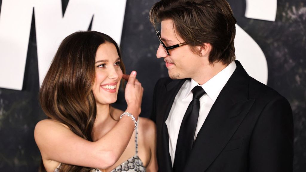 British actress Millie Bobby Brown (L) and US actor Jake Bongiovi attend the premiere of Netflix's "Damsel" at the Paris Theater, in New York, on March 1, 2024.